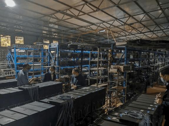 A sprawling bitcoin mining farm in the US with rows of mining rigs